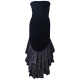 VICKY TIEL Black Velvet Gown with Dramatic Tiered Back and Hem Size 36.This Vicky Tiel gown is composed of black velvet and satin ruffle detailing. There is a center back zipper closure. In excellent vintage condition. **Please cross-reference measurements for personal accuracy. Size in description box is an estimation. Measures (Approximately) Length: 53" Bust: 29" Waist: 24.75" Hip: 35.75"