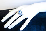 DIAMOND with Blue Topaz Center Stone Ring and 18 Karat White Gold Accents Size 5