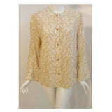 Chanel 2 pc Cream & Yellow Silk Blouse and Tank Set.This is a two piece cream and yellow print silk blouse and tank set by Chanel, from the 1990's. The blouse has five gold logo buttons down the front and two open patch pockets. The tank has a scoop neckline with top stitching detail. Measurements:BlouseLength(Shoulder to hem): 27"Shoulder to shoulder: 16"Sleeve: 22 1/2"Bust: 40"Waist: 40"Hip: 42"TankLength: 22 1/2"Bust: 38"Waist: 39"Hip: 40"