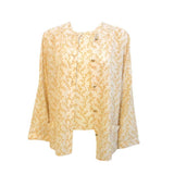 Chanel 2 pc Cream & Yellow Silk Blouse and Tank Set.This is a two piece cream and yellow print silk blouse and tank set by Chanel, from the 1990's. The blouse has five gold logo buttons down the front and two open patch pockets. The tank has a scoop neckline with top stitching detail. Measurements:BlouseLength(Shoulder to hem): 27"Shoulder to shoulder: 16"Sleeve: 22 1/2"Bust: 40"Waist: 40"Hip: 42"TankLength: 22 1/2"Bust: 38"Waist: 39"Hip: 40"