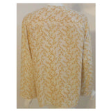Chanel 2 pc Cream & Yellow Silk Blouse and Tank Set.This is a two piece cream and yellow print silk blouse and tank set by Chanel, from the 1990's. The blouse has five gold logo buttons down the front and two open patch pockets. The tank has a scoop neckline with top stitching detail. Measurements:BlouseLength(Shoulder to hem): 27"Shoulder to shoulder: 16"Sleeve: 22 1/2"Bust: 40"Waist: 40"Hip: 42"TankLength: 22 1/2"Bust: 38"Waist: 39"Hip: 40"