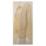 Chanel 2 pc Cream & Yellow Silk Blouse and Tank Set.This is a two piece cream and yellow print silk blouse and tank set by Chanel, from the 1990's. The blouse has five gold logo buttons down the front and two open patch pockets. The tank has a scoop neckline with top stitching detail. Measurements:BlouseLength(Shoulder to hem): 27"Shoulder to shoulder: 16"Sleeve: 22 1/2"Bust: 40"Waist: 40"Hip: 42"TankLength: 22 1/2"Bust: 38"Waist: 39"Hip: 40"