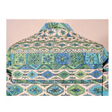 EMILIO PUCCI 1970s Mint Green & White Cotton Print Jacket. Made exclusively for Saks Fifth Avenue by Emilio Pucci Italy. Comprised of a blue, green and white abstract print cotton, with the signature "Emilio" throughout the pattern. The front closure snaps all the way down on a separate panel. There is no lining.Size: 12Measurements: Bust: 38"Sleeve: 21"Shoulder to shoulder: 17"Length: 26"