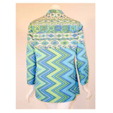 EMILIO PUCCI 1970s Mint Green & White Cotton Print Jacket. Made exclusively for Saks Fifth Avenue by Emilio Pucci Italy. Comprised of a blue, green and white abstract print cotton, with the signature "Emilio" throughout the pattern. The front closure snaps all the way down on a separate panel. There is no lining.Size: 12Measurements: Bust: 38"Sleeve: 21"Shoulder to shoulder: 17"Length: 26"