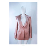 GIORGIO ARMANI Pink Mauve Silk Pant Suit with Beaded Mesh Body Suit Size 42. This Giorgio Armani pant suit is composed of a pink mauve hue silk, comes with a brown beaded mesh bodysuit. The jacket has a center front button closure, and the pants feature a zipper closure. In excellent condition