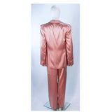 GIORGIO ARMANI Pink Mauve Silk Pant Suit with Beaded Mesh Body Suit Size 42. This Giorgio Armani pant suit is composed of a pink mauve hue silk, comes with a brown beaded mesh bodysuit. The jacket has a center front button closure, and the pants feature a zipper closure. In excellent condition