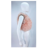 This Givenchy jacket is composed of a soft mauve pink marabou and features rhinestone jewel accents at the shoulders. The base is composed of silk and features a silk organza interior. In excellent condition.