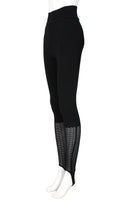 ALAÏA Circa 1990s RARE Black Knit Stirrup Leggings with Fishnet bottoms. Alaïa stirrup leggings. Black thick knit wool blend. Stretchy waistband. Pull-on style.
