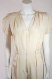 NOLAN MILLER Attributed Silk Jumpsuit Ensemble with Coat