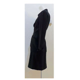THIERRY MUGLER Silver and Rhinestone Hardware Skirt Suit Size 40. This THIERRY MUGLER skirt suit is composed of a black polyester fabric. Features a classic Mugler silhouette with nipped waist and curved bust-line to neckline design. The jacket has front snap closures, rounded shoulders, and silver and rhinestone hardware detail. The classic pencil style skirt features a zipper closure. In good vintage pre-owned condition. Made in France.Measurements in Inches:JacketBust: 38Waist: 29SkirtWaist: 26Hip: 40Len