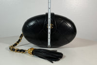 CHANEL Vintage Black Quilted Lambskin Oval Clutch w/ Logo Tassel