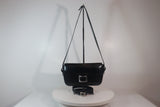 HERMÈS Black Leather Crossbody Bag with Silver Buckle and Adjustable Strap