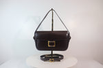 HERMÈS Dark Brown Leather Crossbody Bag with Gold Buckle and Adjustable Strap