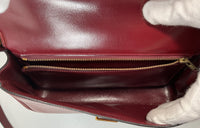 HERMÈS Burgundy Leather Two-Way Crossbody Bag with Adjustable Strap