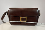 HERMÈS Dark Brown Leather Crossbody Bag with Gold Buckle and Adjustable Strap