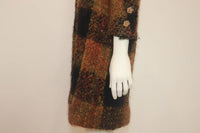 CHANEL HAUTE COUTURE 1960s Black and Multicolored Plaid Boucle Coat
