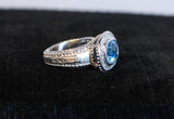 DIAMOND with Blue Topaz Center Stone Ring and 18 Karat White Gold Accents Size 5