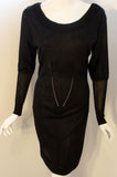 ALAÏA 1990s Black Sheer Jersey Long Sleeve Scoop Neck Dress. This is a sheer black Rayon jersey knit long sleeve dress by Alaia, from the 1990's. The dress has scoop neckline and trumpet sleeves. Size Large Length: 38" Sleeve: 25" Bust: 34-36" Waist: 25-27" Hip: 33-36"