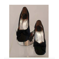 CHRISTIAN DIOR 1050s Souliers Black Satin Rhinestone Heels. This is a pair of vintage black satin rhinestone heels by Souliers Christian Dior, from the 1950's. They have black satin bows on the front with rhinestone detail all over the heel, there are some missing due to vintage age
