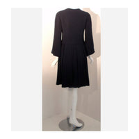 CHRISTIAN DIOR 1964 2 piece Navy Dress Suit Size 4 This is a "one of a kind" 2pc navy blue dress and coat set by Christian Dior Haute Couture from 1964. The dress is attatched to the coat with two snaps in the front. The coat has bell sleeves and four front buttons