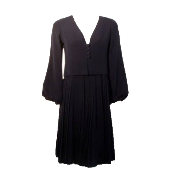 CHRISTIAN DIOR 1964 2 piece Navy Dress Suit Size 4 This is a "one of a kind" 2pc navy blue dress and coat set by Christian Dior Haute Couture from 1964. The dress is attatched to the coat with two snaps in the front. The coat has bell sleeves and four front buttons