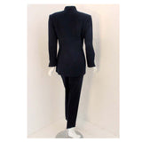 CHRISTIAN DIOR 1980s 2 pc Dark Blue Pant Suit. This is a smart pant suit from Christian Dior. The jacket has lightly padded shoulders and a one button front closure. The pants have a high waist and have pleats in the front.Size 8 USMeasurements:Jacket:Length(Shoulder to hem): 30"Shoulder to Shoulder: 16 1/2"Sleeve: 31"Bust: 38"Pants:Length: 40Inseam: 28"Waist: 26"Hip: 36"