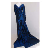 CHRISTIAN DIOR 1988 Long Blue Gown. This is a long royal blue silk taffeta gown by Christian Dior Haute Couture, from 1988-89. The gown has long sleeves, a wrapped front and back bodice, a large bow on the side hip, and two long trains