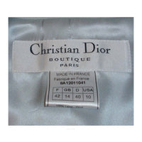 CHRISTIAN DIOR 1990s 2 pc Light Blue Skirt Suit This is a smart looking 2 piece skirt suit from Christian Dior. It is made of a light periwinkle blue wool with a matching silk lining. This suit has a fitted single button blazer with faux padded pockets, and a straight pencil skirt. Both jacket and skirt have fringed edges. Made in France
