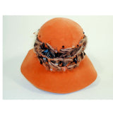 MeasurementsCHRISTIAN DIOR Chapeaux Orange Floppy Hat w/ Feathers, Yarn, & Beads.:21" (size 6 3/4)Depth about 6 inches3 3/4" brim