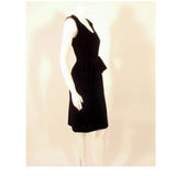 CHRISTIAN DIOR Haute Couture Black Velvet Cocktail Dress. This is a custom Haute Couture cocktail dress from Christian Dior. It is a lovely fitted dress with a bow at the waist, made from a soft black velvet. There is a metal zipper down the back.Measurements: Bust: 34" Waist: 25"Hip: 34"Length: 40"