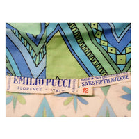 EMILIO PUCCI 1970s Mint Green & White Cotton Print Jacket. Made exclusively for Saks Fifth Avenue by Emilio Pucci Italy. Comprised of a blue, green and white abstract print cotton, with the signature "Emilio" throughout the pattern. The front closure snaps all the way down on a separate panel. There is no lining.Size: 12Measurements: Bust: 38"Sleeve: 21"Shoulder to shoulder: 17"Length: 26"