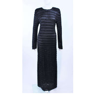 GIORGIO ARMANI Black Beaded Sheer Mesh Gown Size 42. This Giorgio Armani gown is composed of a beaded sheer mesh. There is a center back zipper closure. In excellent vintage condition