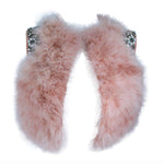 This Givenchy jacket is composed of a soft mauve pink marabou and features rhinestone jewel accents at the shoulders. The base is composed of silk and features a silk organza interior. In excellent condition. 