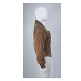 This Gucci jacket is composed of a supple khaki brown hue suede. Features center front button closures, and shoulder pads. In excellent vintage condition.
