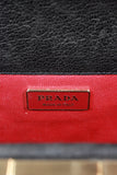 PRADA Black Leather Handbag with Gold Grommets