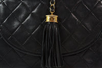 CHANEL 1990s Quilted Black Leather Crossbody Bag with Tassel