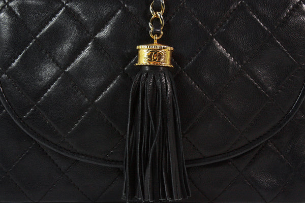 chanel bag with black chain necklace