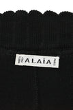 ALAÏA Circa 1990s leggings Black Scalloped Waist. Alaïa leggings. Black thick knit cotton blend. Stretchy scalloped trim at the waist and hem. Pull-on style. Made in Italy.