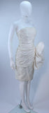 VICKY TIEL White Beaded Pearl Accent Cocktail Dress Size 4. This Vicky Tiel dress is composed of a white pearl accent beaded fabric, with ruching and gathers. There is a side zipper closure. In excellent vintage condition. **Please cross-reference measurements for personal accuracy. Measures (Approximately) Length: 31" Bust: 29" Waist: 26" Hip: 36"
