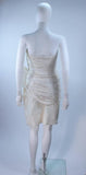 VICKY TIEL White Beaded Pearl Accent Cocktail Dress Size 4. This Vicky Tiel dress is composed of a white pearl accent beaded fabric, with ruching and gathers. There is a side zipper closure. In excellent vintage condition. **Please cross-reference measurements for personal accuracy. Measures (Approximately) Length: 31" Bust: 29" Waist: 26" Hip: 36"