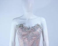 VICKY TIEL Blush Beaded Lace Corset Gown Size 6-8. This Vicky Tiel gown is composed of a beaded lace and silk in a blush hue. Features a boned corset upper and draped skirt. There is a center back zipper closure. In excellent condition. **Please cross-reference measurements for personal accuracy. Marked size 10, but fits more like 6-8. Measures (Approximately) Length: 49.5" Bust: 32" Waist: 27.25" Hip: 36"