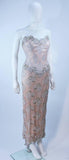 VICKY TIEL Blush Beaded Lace Corset Gown Size 6-8. This Vicky Tiel gown is composed of a beaded lace and silk in a blush hue. Features a boned corset upper and draped skirt. There is a center back zipper closure. In excellent condition. **Please cross-reference measurements for personal accuracy. Marked size 10, but fits more like 6-8. Measures (Approximately) Length: 49.5" Bust: 32" Waist: 27.25" Hip: 36"