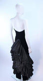 VICKY TIEL Black Velvet Gown with Dramatic Tiered Back and Hem Size 36.This Vicky Tiel gown is composed of black velvet and satin ruffle detailing. There is a center back zipper closure. In excellent vintage condition. **Please cross-reference measurements for personal accuracy. Size in description box is an estimation. Measures (Approximately) Length: 53" Bust: 29" Waist: 24.75" Hip: 35.75"