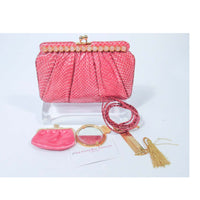 JUDITH LEIBER Pink Snakeskin Clutch w/ Optional Strap Mirror Coin Purse . This Judith Leiber purse is composed of a pink snakeskin. Features a bar style frame with cabochon stone accents and gold hardware. There is an interior pocket and two slide pockets. In excellent 'like new' pre-owned condition (some signs of wear due to age, see photos). Sold "AS-IS". 