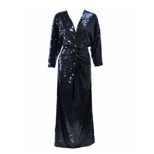 This Oleg Cassini is composed of a sequined black jersey. Features a draped front with center back zipper closure. In excellent vintage condition.
