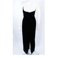 This Oleg Cassini Black Tie gown is composed of a black velvet. Features an absolutely stunning beaded bust with sweet heart neckline. Such an easy an simplistically chic design. There is a zipper closure. Made in USA. 