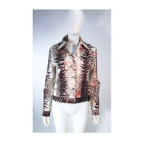 OLEG CASSINI Night Sport Animal Print Sequin Denim Jacket Size 6. This Oleg Cassini jacket is composed of an animal print denim fabric. Features sequin applique throughout & center front zipper closure with front pockets. In excellent vintage condition, some light signs of wear due to age.**Please cross-reference measurements for personal accuracy. Size in description box is an estimation. Measures (Approximately)6Length: 21"Sleeve: 24.5"Shoulder to shoulder: 17"Bust: 40"Waist: 35"