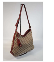 GUCCI Canvas Logo Hobo Style Purse with Tassel
